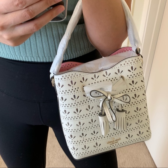 kate spade Handbags - KATE SPADE SMALL DRAWSTRING BUCKET HAYES WHITE BAG